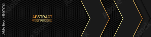 Carbon fiber black hexagon texture. Black and gold arrows on dark carbon mesh.