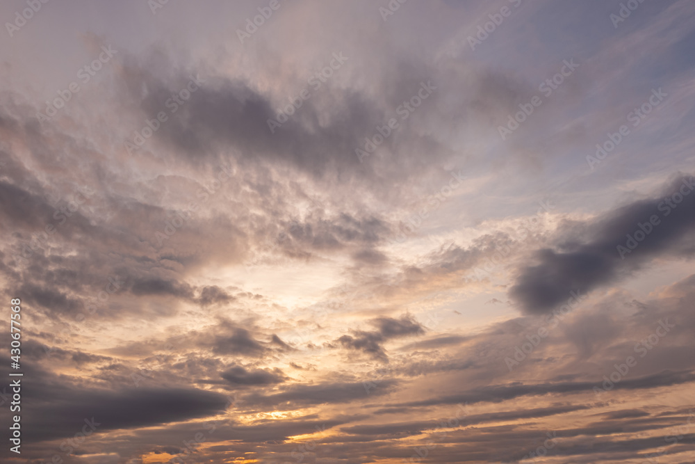 abstract background of cloudy sunset sky, golden hour