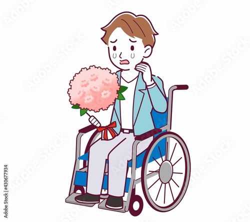 車椅子に乗った男の子