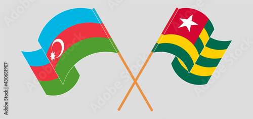 Crossed and waving flags of Azerbaijan and Togo