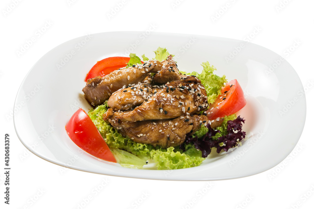 chicken in teriyaki sauce served with salad isolated on white background
