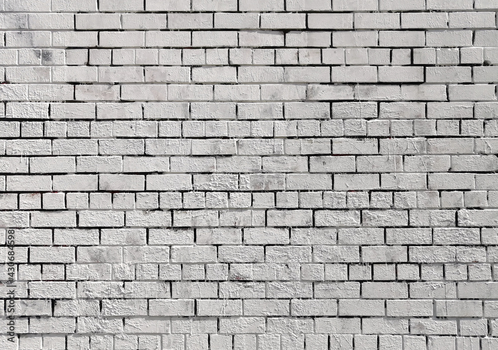 Obraz premium White brick wall background with rough texture