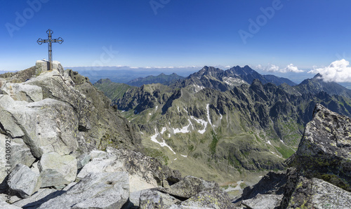 Beautiful shot of a Slovakia summit cross on Gerlachovsky stit in High Tatras, Slovakia photo