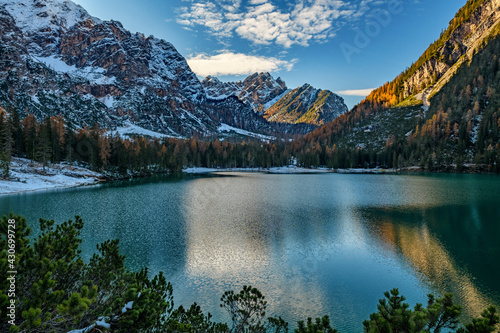 The beautiful Braies lake in late autumn with a little snow, Pearl of the Dolomite lakes is an UNESCO heritage and is located in the Braies Alto Adige,Italy