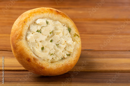 Arabic cheese sfiha on the table.