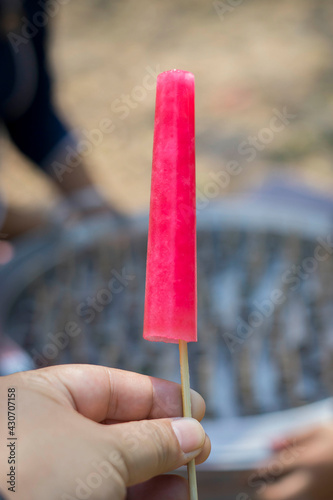 Traditional thai ice cream in stanless tube on market photo