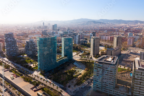 Aerial panoramic view of Barcelona modern neighborhood of Diagonal Mar i el Front Maritim del Poblenou on Mediterranean coast  Spain..
