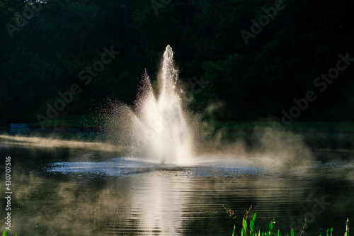 A small lake in florida and morning fog on lake at sunrise.