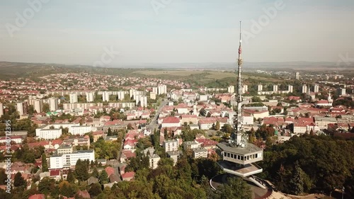 Cinematic aerial drone orbiting shot of the TV Tower of Miskolc, fourth largest city and a major industrial hub, Northern regional center of Hungary, capital of Borsod-Abaúj-Zemplén county photo