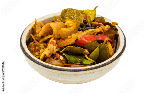 Stir fried spicy wild boar with red chili in White bowl on isolated on white background with clipping path. Selective focus.