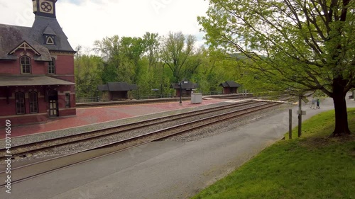 Point of Rocks is a small town on the border of Virginia and Maryland, with historic buildings. Footage shows historic brick railway station build in 1873 as part of Baltimore Ohio railroad