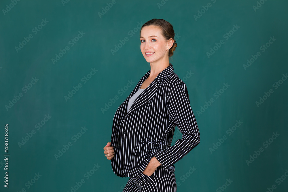 Portrait of cute and elegance executive woman in formal jacket suit standing and smile to camera with self-confident
