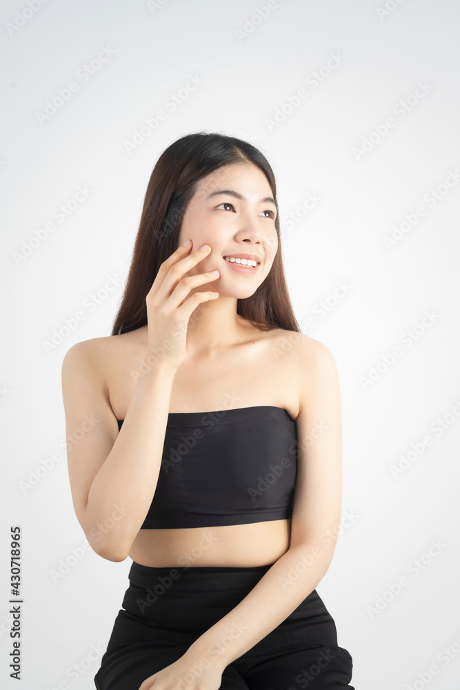 Portrait of beautiful asian woman makeup of cosmetic, girl hand touch cheek and smile attractive, face of beauty perfect with wellness isolated on white background with skin healthcare concept. Portrait of beautiful asian woman makeup of cosmetic, girl hand touch cheek and smile attractive, face of beauty perfect with wellness isolated on white background with skin healthcare concept.