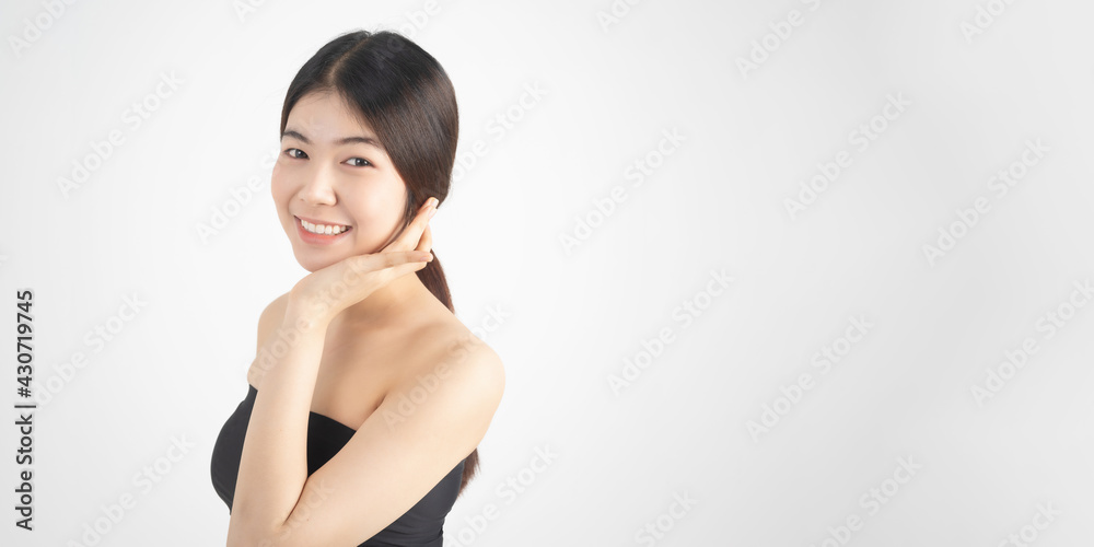 Portrait of beautiful asian woman makeup of cosmetic, girl hand touch cheek and smile attractive, face of beauty perfect with wellness isolated on white background with skin healthcare concept. Portrait of beautiful asian woman makeup of cosmetic, girl hand touch cheek and smile attractive, face of beauty perfect with wellness isolated on white background with skin healthcare concept.