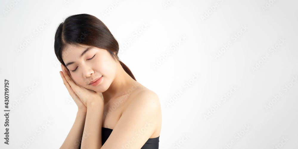 Portrait of beautiful asian woman makeup of cosmetic, girl hand touch cheek and smile attractive, face of beauty perfect with wellness isolated on white background with skin healthcare concept. Portrait of beautiful asian woman makeup of cosmetic, girl hand touch cheek and smile attractive, face of beauty perfect with wellness isolated on white background with skin healthcare concept.