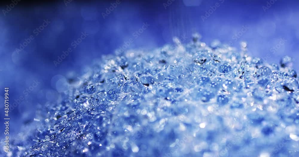 Blue glass crystal balls, abstract artistic shot, extreme closeup