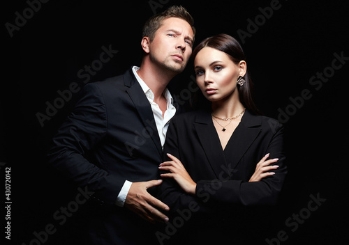 beautiful woman with handsome man in suit. Couple
