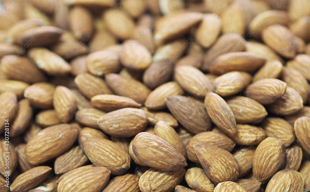 Fototapeta premium Dried brown toasted almonds nut snack, Vegetarian meal, Healthy eating ready for eat