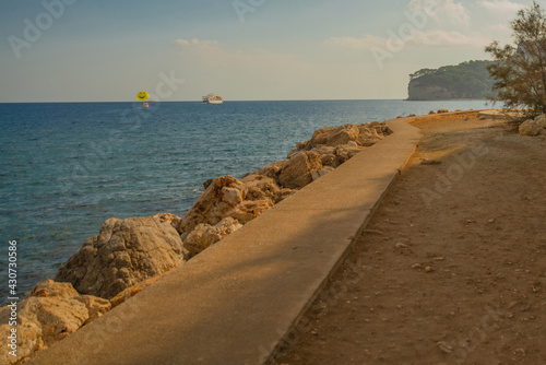 KEMER, TURKEY: Landscape with a view of the road on the embankment in the territory of Yoruk Park photo