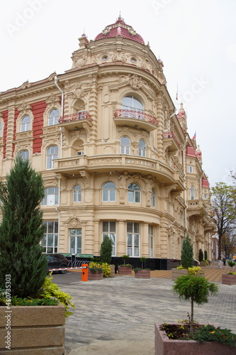  The building of the City Duma, 1899. Architect A. Pomerantsev. Nearby there are cars and pedestrians photo