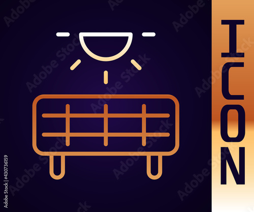 Gold line Solar energy panel icon isolated on black background. Vector