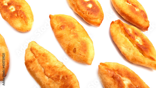 Fried patties in oil isolated on a white background.
