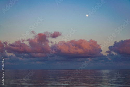 ocean horizon with moon