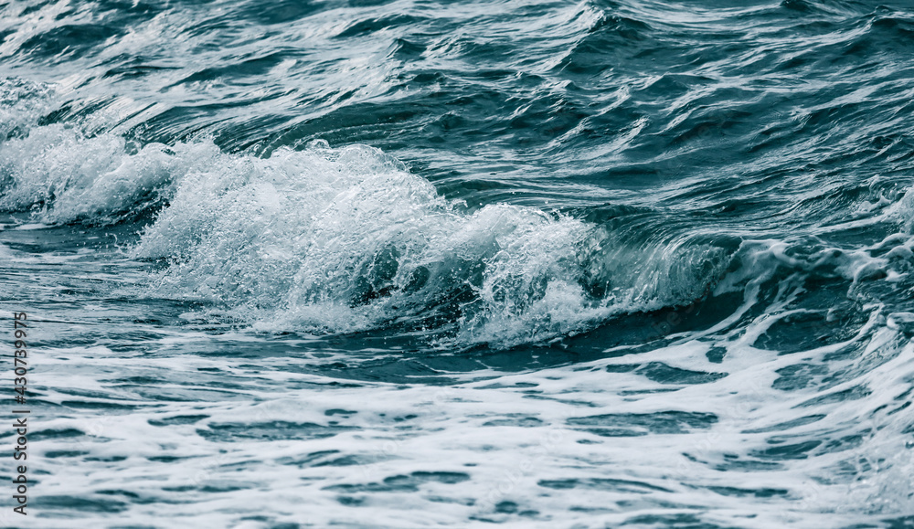 Fototapeta premium Wave in the sea with splashing water.