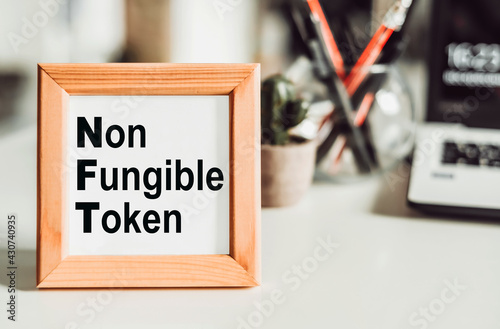 NFT non - fungible tokens inscription in the art frame.