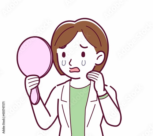 Young woman in a lab coat