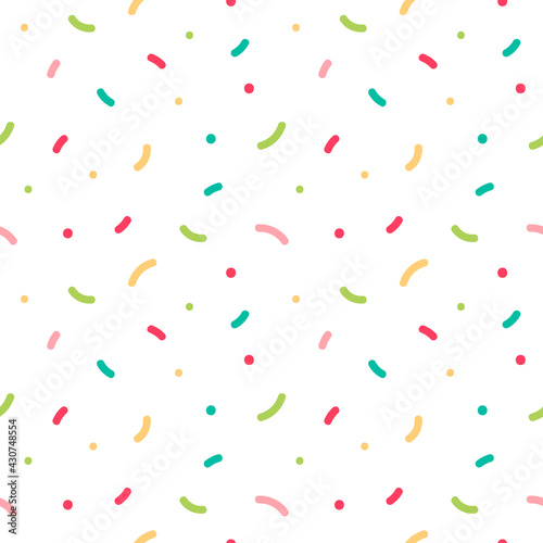 Colorful confetti, sprinkles and dots vector seamless pattern background for party, celebration design.