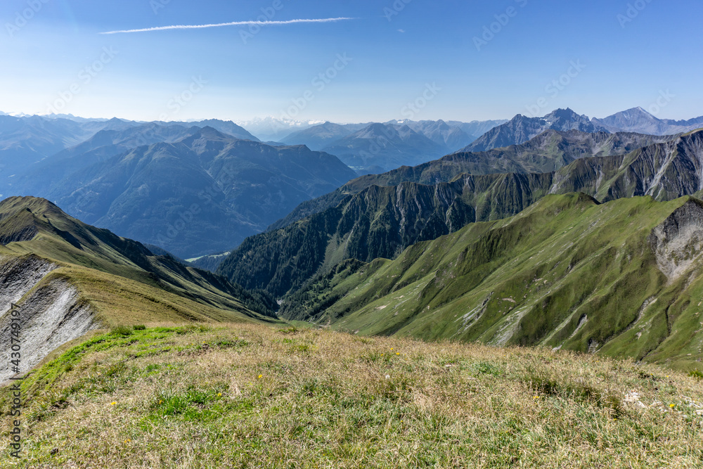 mountain panorama in tirol - austria in summer with a far-reaching view