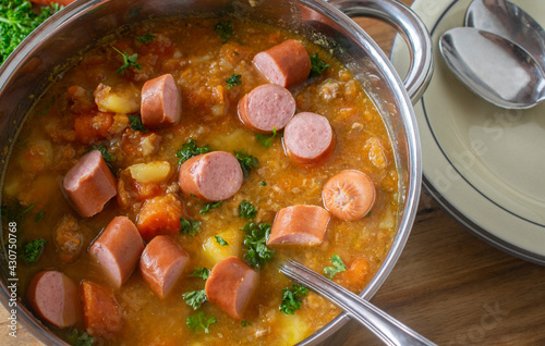 Carrot stew with minced meat, root vegetable and vienna sausage