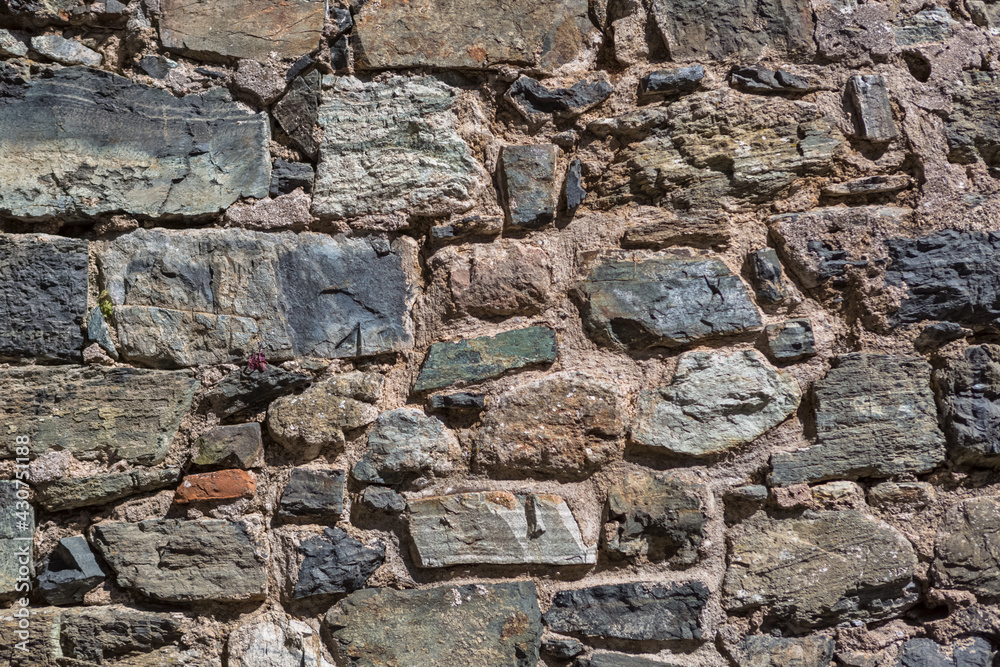 Architecture textures, granite and schist mix, medieval paired masonry wall Architecture textures, granite and schist mix, medieval paired masonry wall
