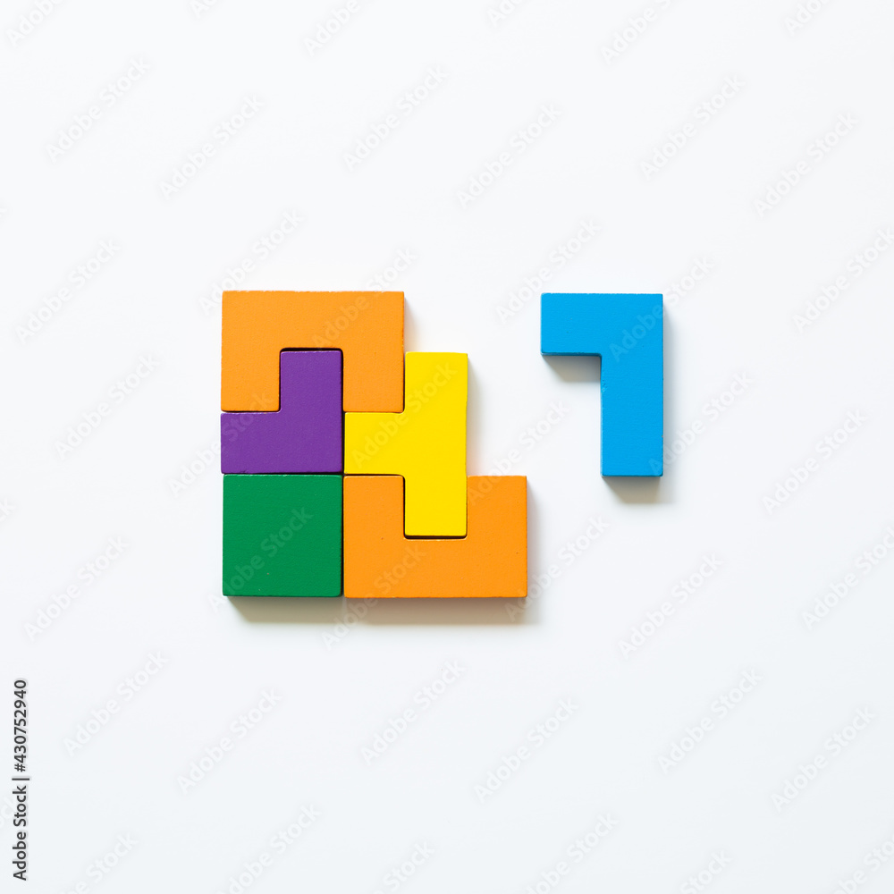 Color blocks on white background. Creative thinking, idea, problem solving, success concept. top view Color blocks on white background. Creative thinking, idea, problem solving, success concept. top view