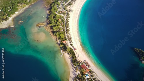 Amazing beautiful panoramic view from drone of natural park of Oludeniz and Fethiye blue lagoon and tranquil aquamarine dead sea.
