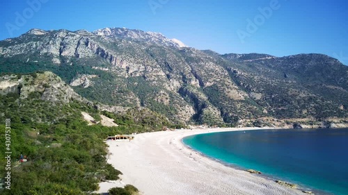 Amazing high angle top drone view on world famous paragliding and parasailing turkish spot for extrim parachute sport in Oludeniz in Fethiye, Turkey
