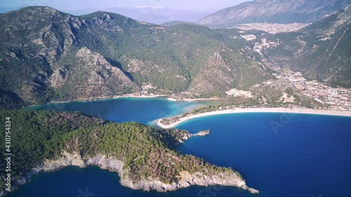 Amazing beautiful panoramic view from drone of natural park of Oludeniz and Fethiye blue lagoon and tranquil aquamarine dead sea.

