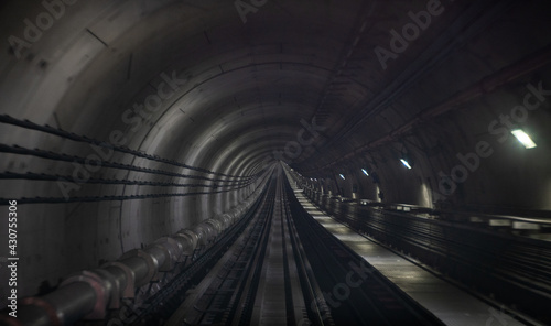 Underground one way metro subway tunnel with blur effect. defocus