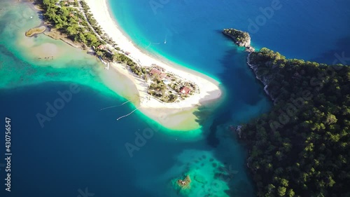 Amazing beautiful panoramic view from drone of natural park of Oludeniz and Fethiye blue lagoon and tranquil aquamarine dead sea.
