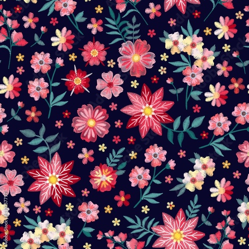 Embroidery floral seamless pattern with bright flowers. Vector design for fashion clothing.