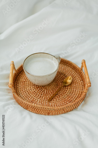 Breakfast in bed  cappuccino  wicker tray  spring  home decor. Cozy.