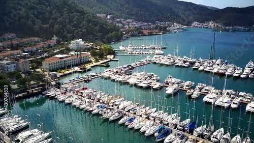 Drone view on beautiful Fethiye city and Fethiye harbor full of yachts and boats