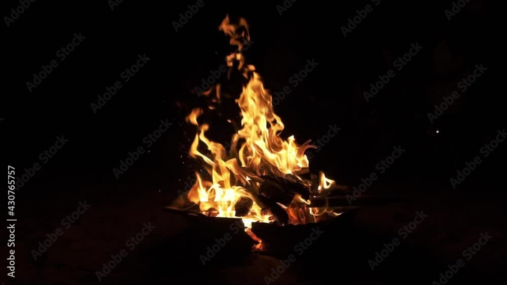 camp fire burns wood, night shot in slow motion. camp fire burns wood, night shot in slow motion.