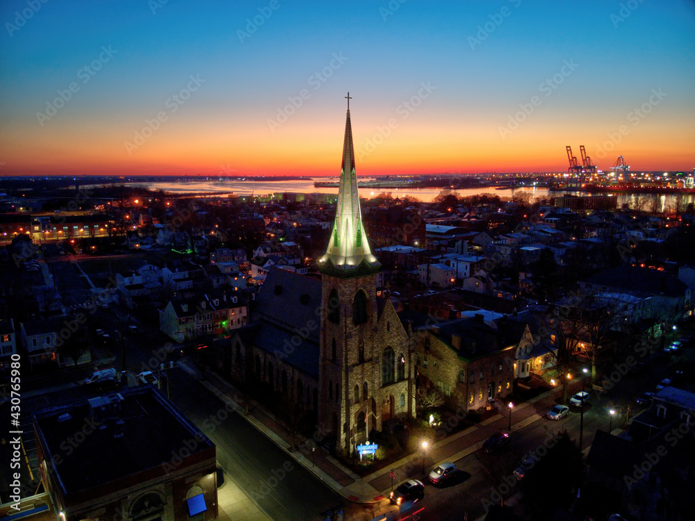 Church Steeple Against a Sunset River Background Church Steeple Against a Sunset River Background