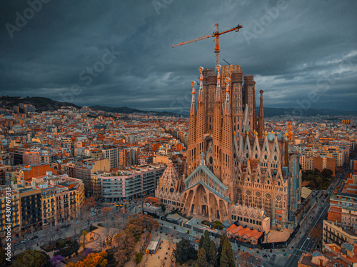 The Cathedral of La Sagrada Familia by the architect Antonio Gaudi, Catalonia, Barcelona Spain - April 2021. Aerial view