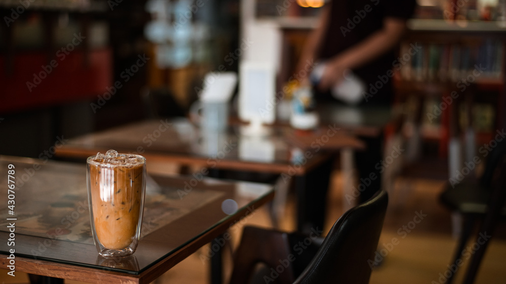 iced coffee on the table inside the cafe