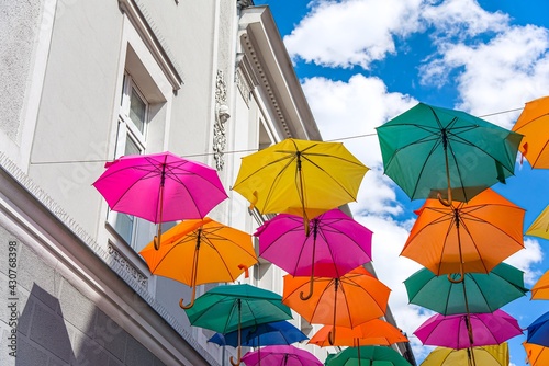 umbrellas against a sunny sky. summer background
