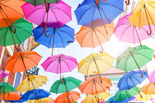 umbrellas against a sunny sky. summer background