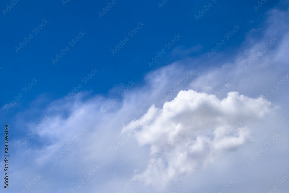 Group of white fluffy and soft cloudy after hard raining on blue sky. Background with copy space for meteorology presentation or natural and environment concept.